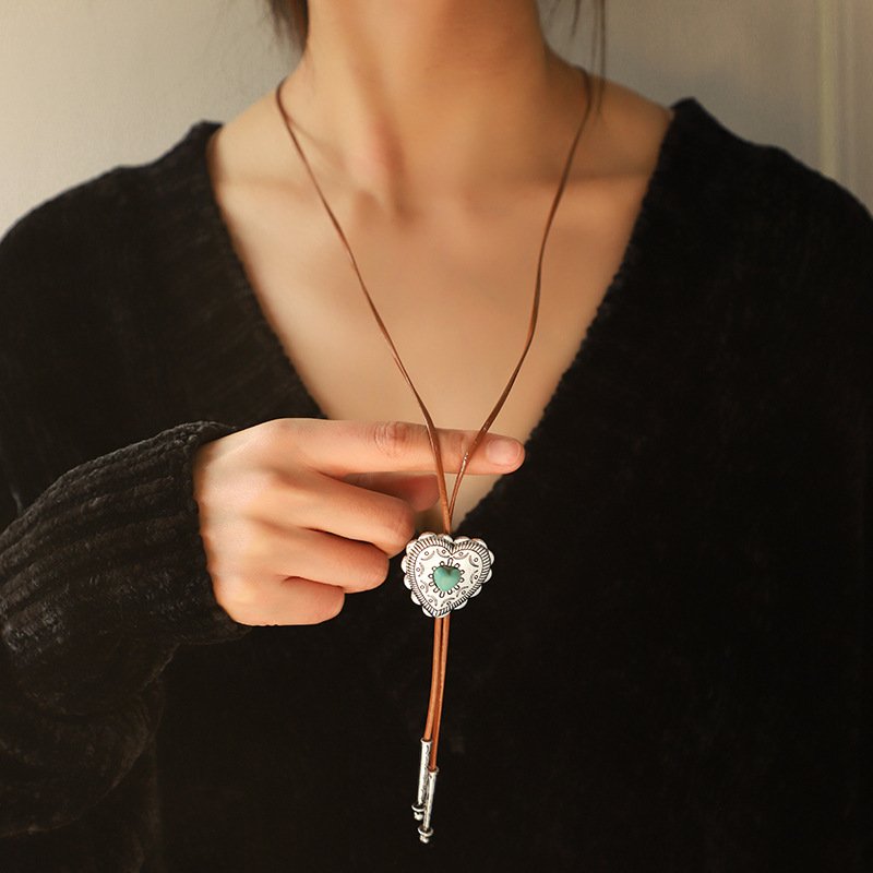 Turquoise-tone heart and cross bolo necklace styles